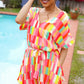Eyes On You Coral Geo Abstract Surplice Woven Romper