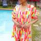 Eyes On You Coral Geo Abstract Surplice Woven Romper
