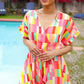 Eyes On You Coral Geo Abstract Surplice Woven Romper