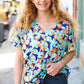 Blue & Orange Flat Floral V Neck Top