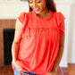 Red-Orange Mock Neck Flutter Sleeve Top