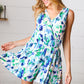 Lovely In Green & Blue Floral Sleeveless Surplice Romper