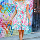 Under Your Spell Floral Smocked Flutter Sleeve Ruffle Mini Dress