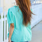 Follow Me Mint Frill Mock Neck Woven Top