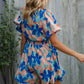 Feeling Bold Turquoise Floral Smocked Waist Flutter Sleeve Romper