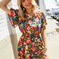 Sunny Days Floral Print Smocked Waist Back Neck Button Romper