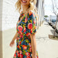 Sunny Days Floral Print Smocked Waist Back Neck Button Romper