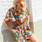 Sunny Days Floral Print Smocked Waist Back Neck Button Romper
