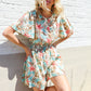 Get Whimsical Tropical Print Smocked Waist Neck Button Romper