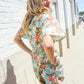 Get Whimsical Tropical Print Smocked Waist Neck Button Romper