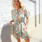 Get Whimsical Tropical Print Smocked Waist Neck Button Romper