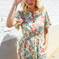 Get Whimsical Tropical Print Smocked Waist Neck Button Romper