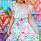 Under Your Spell Floral Smocked Flutter Sleeve Ruffle Mini Dress
