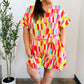 Eyes On You Coral Geo Abstract Surplice Woven Romper