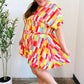 Eyes On You Coral Geo Abstract Surplice Woven Romper